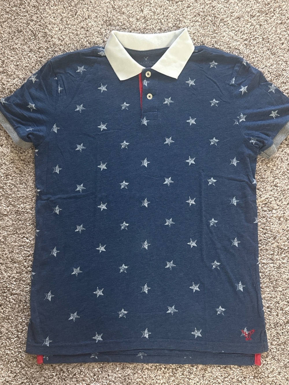 American Eagle Outfitters Navy Polo with Star Print and Cream Collar